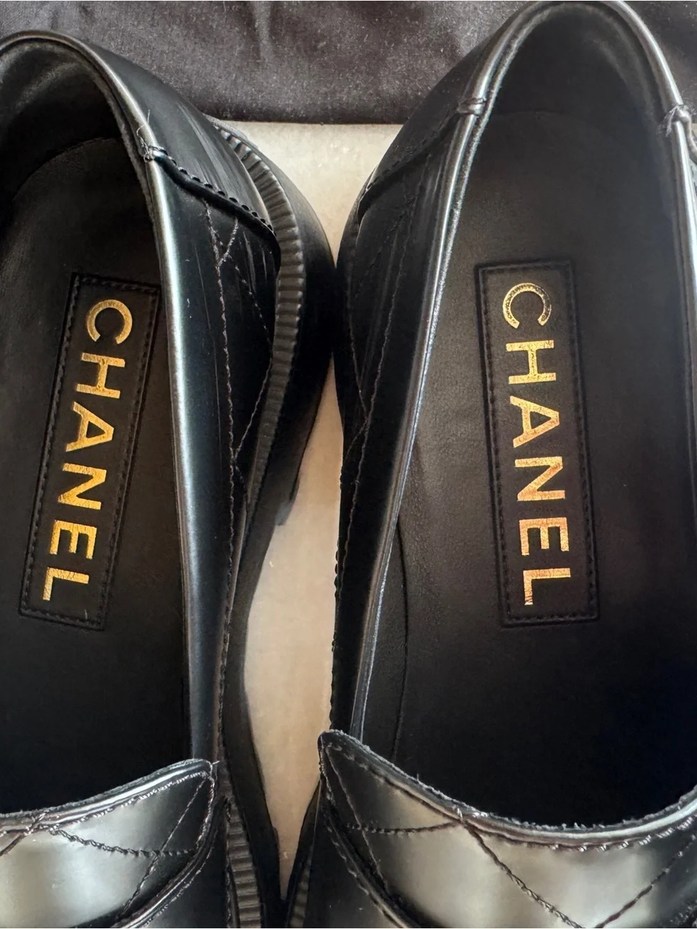 CHANEL Black Quilted Leather Loafers with Gold CC Hardware